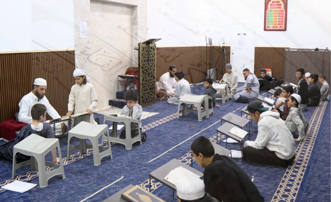 The Daar Al Huffaz hall with several teacher-led halaqat in session